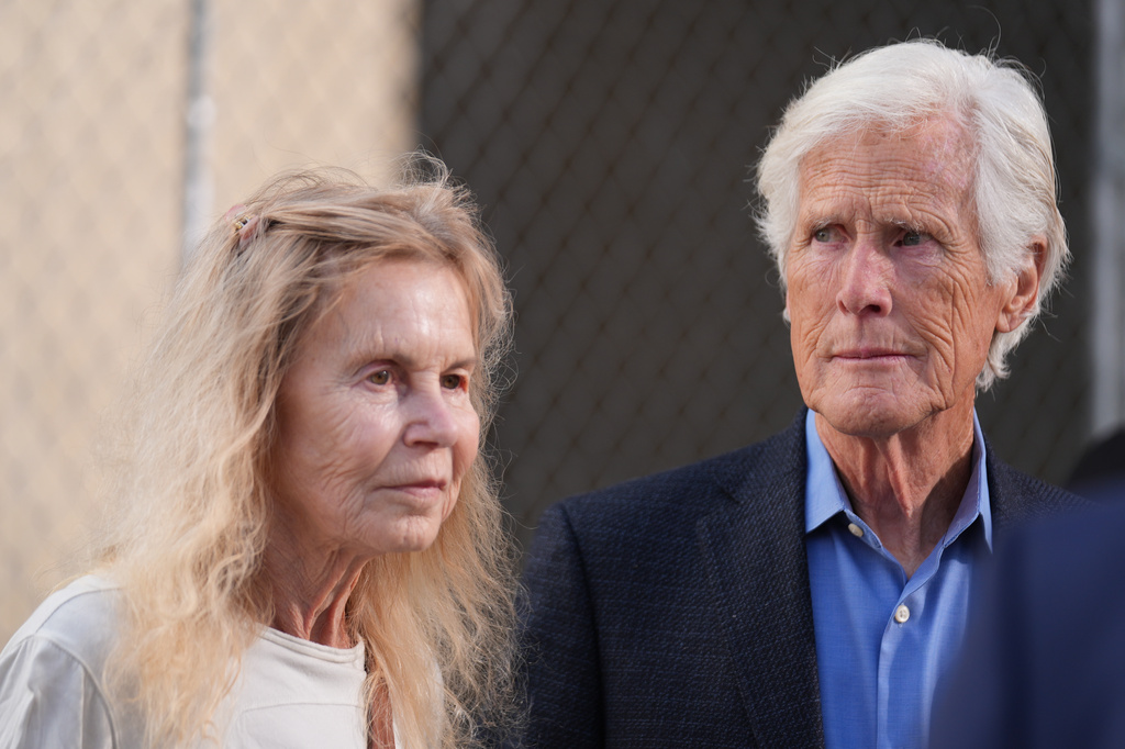 Suzanne Morrison, mother of Matthew Perry, walks into court with her husband Keith Morrison before Jasveen Sangha, who plead guilty to selling Perry a lethal dose of the drug ketamine in the days before his death, appears in court for sentencing on Wednesday, April 8, 2026 in Los Angeles. (AP Photo/Damian Dovarganes)