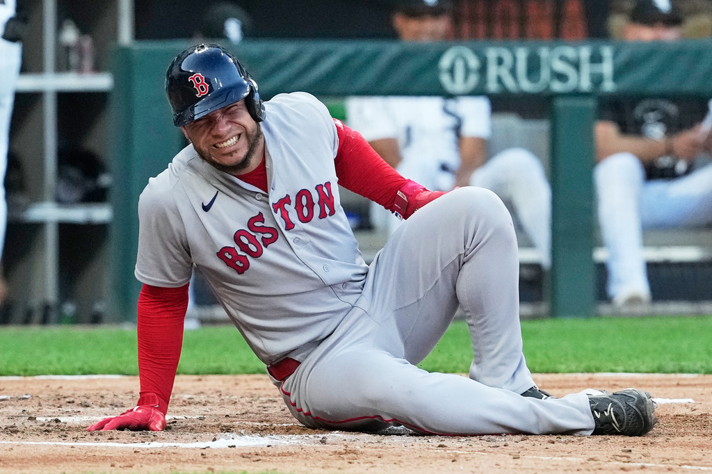 Boston Red Sox's Willson Contreras reacts after an injury during the third inning of a baseball game against the Chicago White Sox in Chicago, Wednesday, July 8, 2026. (AP Photo/Nam Y. Huh)