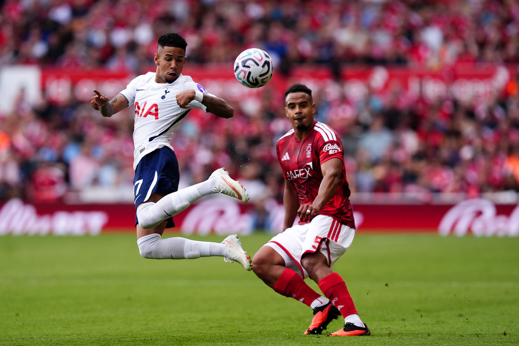 Nottingham Forest's Murillo and Tottenham Hotspur's Savio battle for the ball during the English Premier League soccer match between Nottingham Forest and Tottenham Hotspur in Nottingham, England, Saturday, Sept. 5, 2026. (Mike Egerton/PA via AP)