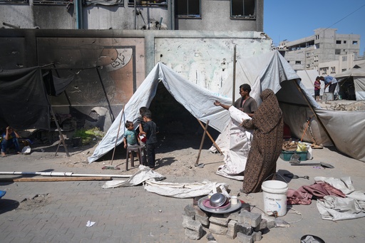 A family sets up a tent near a UN school used as a shelter for displaced Palestinians in Khan Younis, Tuesday, Sept 30, 2025. (AP Photo/Jehad Alshrafi) A family sets up a tent near a UN school used as a shelter for displaced Palestinians in Khan Younis, Tuesday, Sept 30, 2025. (AP Photo/Jehad Alshrafi)