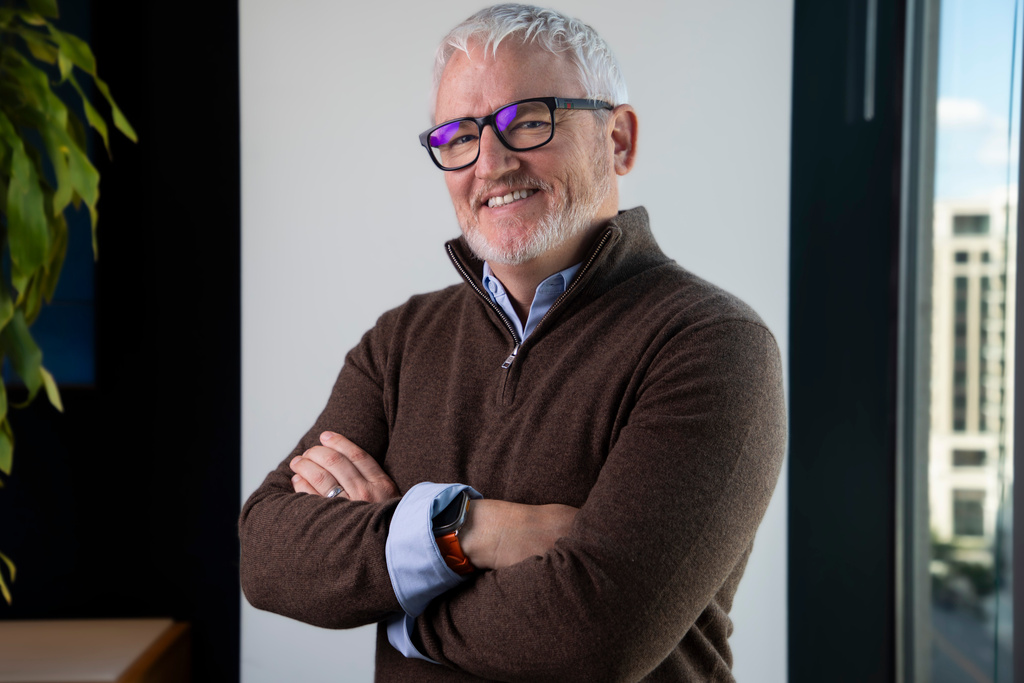 Ares Management partner Joel Holsinger poses for a portrait at his office in the Buckhead neighborhood of Atlanta, Monday, Oct. 13, 2025. (AP Photo/Olivia Bowdoin)