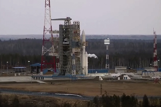 In this photo taken from video released by Roscosmos space corporation on Wednesday, April 10, 2024 an Angara-A5 rocket is seen prior to the launch at Vostochny space launch facility outside the city of Tsiolkovsky, about 200 kilometers (125 miles) from the city of Blagoveshchensk in the far eastern Amur region, Russia. The first test launch of the new Angara-A5 rocket was aborted the second day in a row just moments before the scheduled liftoff. The Angara-A5 is a new heavy-lift rocket developed in Russia. (Roscosmos space corporation via AP)