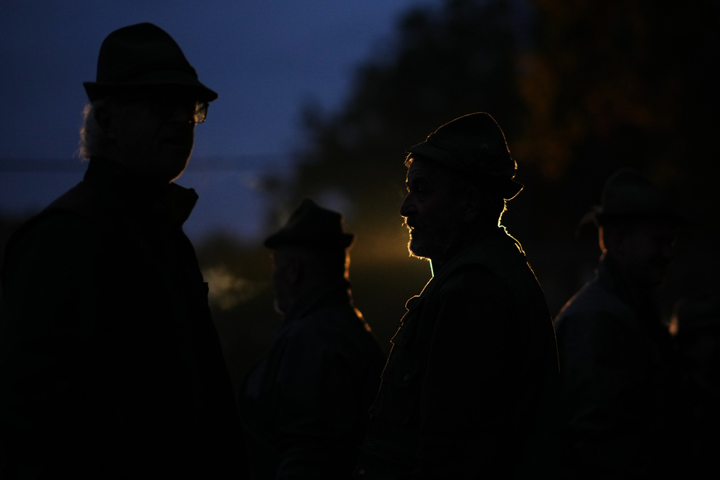 Fishermen prepare for a traditional fish haul of the Rozmberk pond near the town of Trebon, Czech Republic, Friday, Oct. 17, 2025. (AP Photo/Petr David Josek)