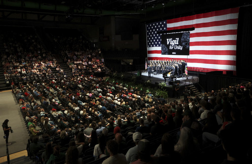 Hundreds attend a Vigil for Unity at the UCCU Center at Utah Valley University in Orem on Friday, Sept. 19, 2025. Charlie Kirk, conservative activist and the founder and president of Turning Point USA, was fatally shot while answering questions at his American Comeback Tour at UVU on Sept. 10. (Kristin Murphy/The Deseret News via AP)