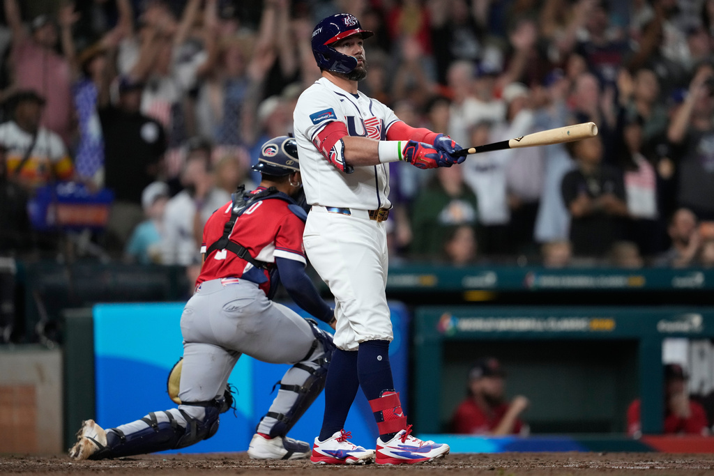 United States designated hitter Kyle Schwarber hits a home run during the fifth inning of a World Baseball Classic game against Britain, Saturday, March 7, 2026, in Houston. (AP Photo/Ashley Landis)