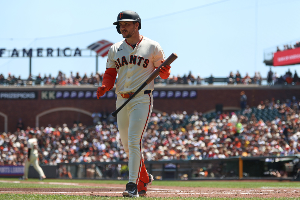 San Francisco Giants' Patrick Bailey walks back to the dugout after striking out against the San Diego Padres during the third inning of a baseball game in San Francisco, Wednesday, May 6, 2026. (AP Photo/Jed Jacobsohn)