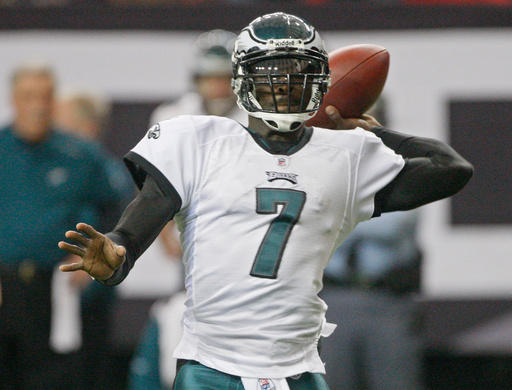 FILE - Philadelphia Eagles quarterback Michael Vick throws in the first quarter during an NFL football game against the Atlanta Falcons, Dec. 6, 2009 in Atlanta. (AP Photo/John Bazemore, file) FILE - Philadelphia Eagles quarterback Michael Vick throws in the first quarter during an NFL football game against the Atlanta Falcons, Dec. 6, 2009 in Atlanta. (AP Photo/John Bazemore, file)