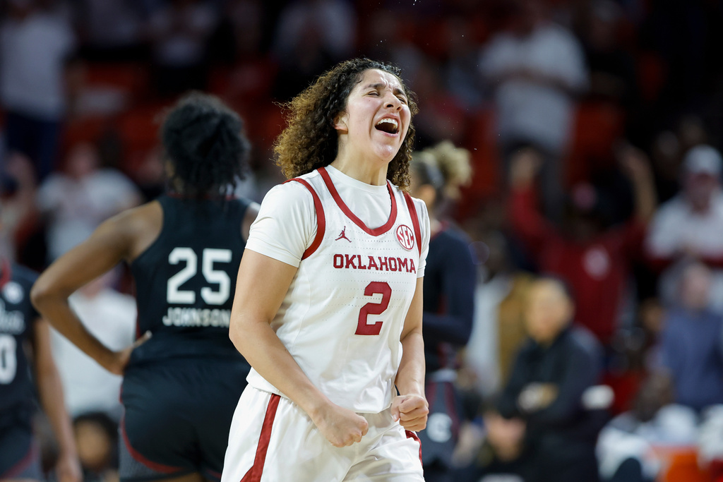 Oklahoma guard Aaliyah Chavez (2) celebrates after scoring against South Carolina during the second half of an NCAA college basketball game Thursday, Jan. 22, 2026 in Norman, Okla. (AP Photo/Alonzo Adams)