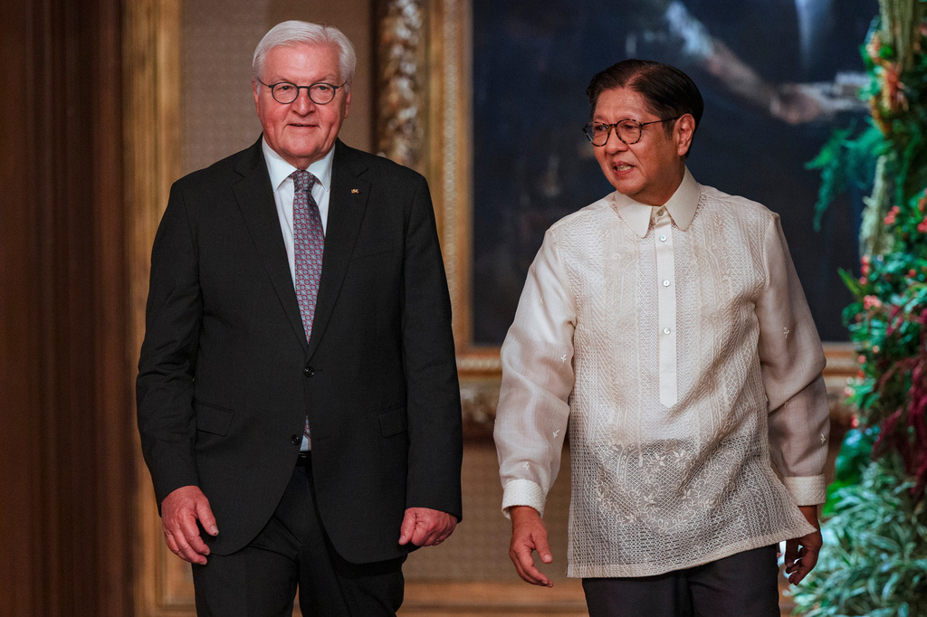 German President Frank-Walter Steinmeier, left, walks with Philippine President Ferdinand Marcos Jr. at Malacanang Palace in Manila, Philippines Tuesday, June 16, 2026. (Ezra Acayan/Pool Photo via AP)