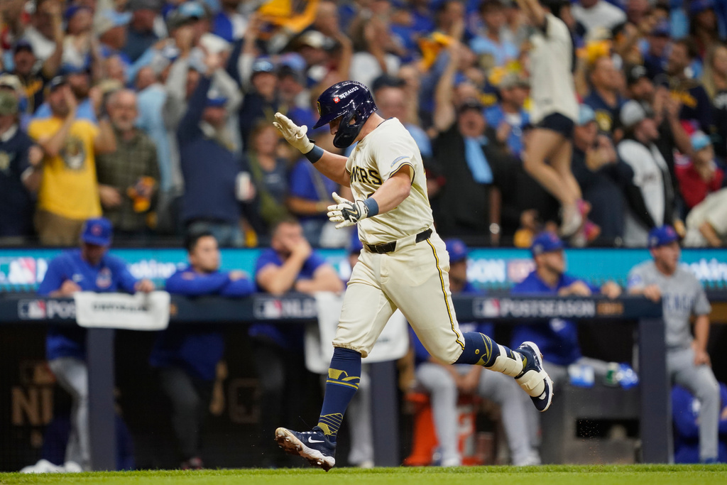 Milwaukee Brewers' Andrew Vaughn (28) runs the bases after hitting a 3-run home run during the first inning of Game 2 of baseball's National League Division against the Chicago Cubs Series Monday, Oct. 6, 2025, in Milwaukee. (AP Photo/Kayla Wolf)