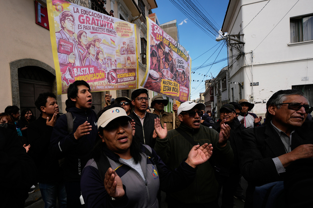 Teachers shout slogans during an anti-government protest in La Paz, Bolivia, Tuesday, Sept. 15, 2026. (AP Photo/Juan Karita)