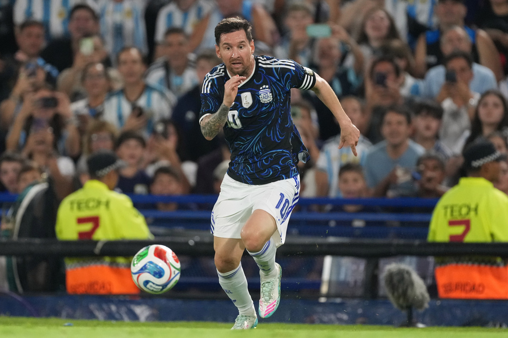 FILE - Argentina's Lionel Messi dribbles during a friendly soccer match against Zambia in Buenos Aires, Argentina, Tuesday, March 31, 2026. (AP Photo/Gustavo Garello, File)