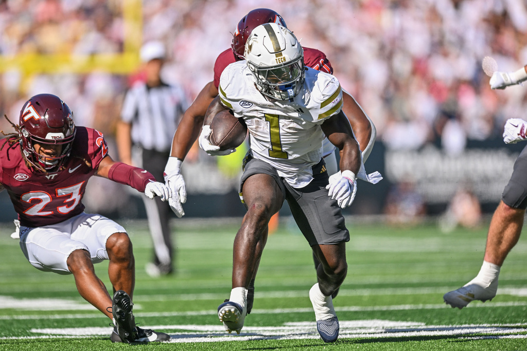 Georgia Tech running back Jamal Haynes (1) runs against Virginia Tech during the first half of an NCAA college football game, Saturday, Oct. 11, 2025 at Bobby Dodd Stadium in Atlanta. (Daniel Varnado/Atlanta Journal-Constitution via AP)