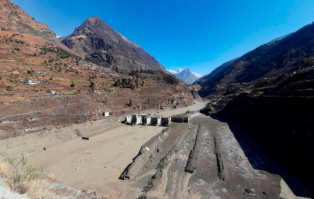 FILE -A view of a damaged hydropower project in northern India after a portion of the Nanda Devi glacier broke off, Feb. 7, 2021. (AP Photo, File)