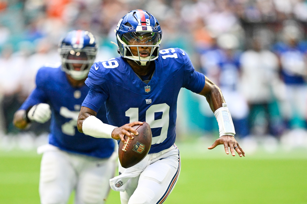 New York Giants quarterback Jameis Winston (19) runs the ball during the first half of a preseason NFL football game against the Miami Dolphins, Saturday, Aug. 22, 2026, in Miami Gardens, Fla. (AP Photo/Doug Murray)