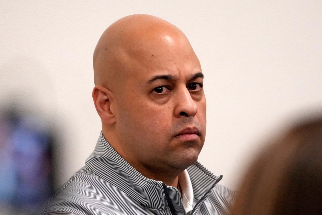 Pittsburgh Steelers general manager Omar Khan listens as owner Art Rooney II meets with reporters Wednesday, Jan. 14, 2026 in Pittsburgh. (AP Photo/Gene J. Puskar)