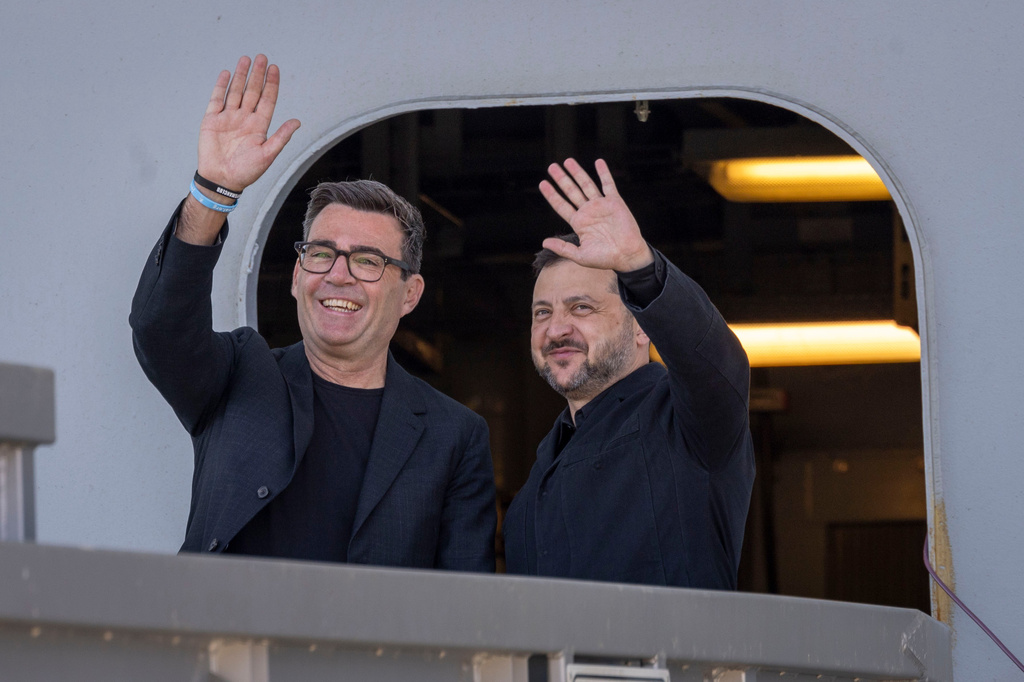 Britain's Prime Minister Andy Burnham, left, and Ukraine's President Volodymyr Zelenskyy visit HM Naval Base in Portsmouth, England, Monday July 27, 2026. (Simon Jones/Pool Photo via AP)