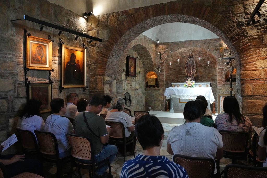 Visitors pray inside the Ephesus House, a replica of the House of the Virgin Mary in Ephesus, Turkey, at Alfonso town, Cavite province, Philippines on July 16, 2026. (AP Photo/Aaron Favila)