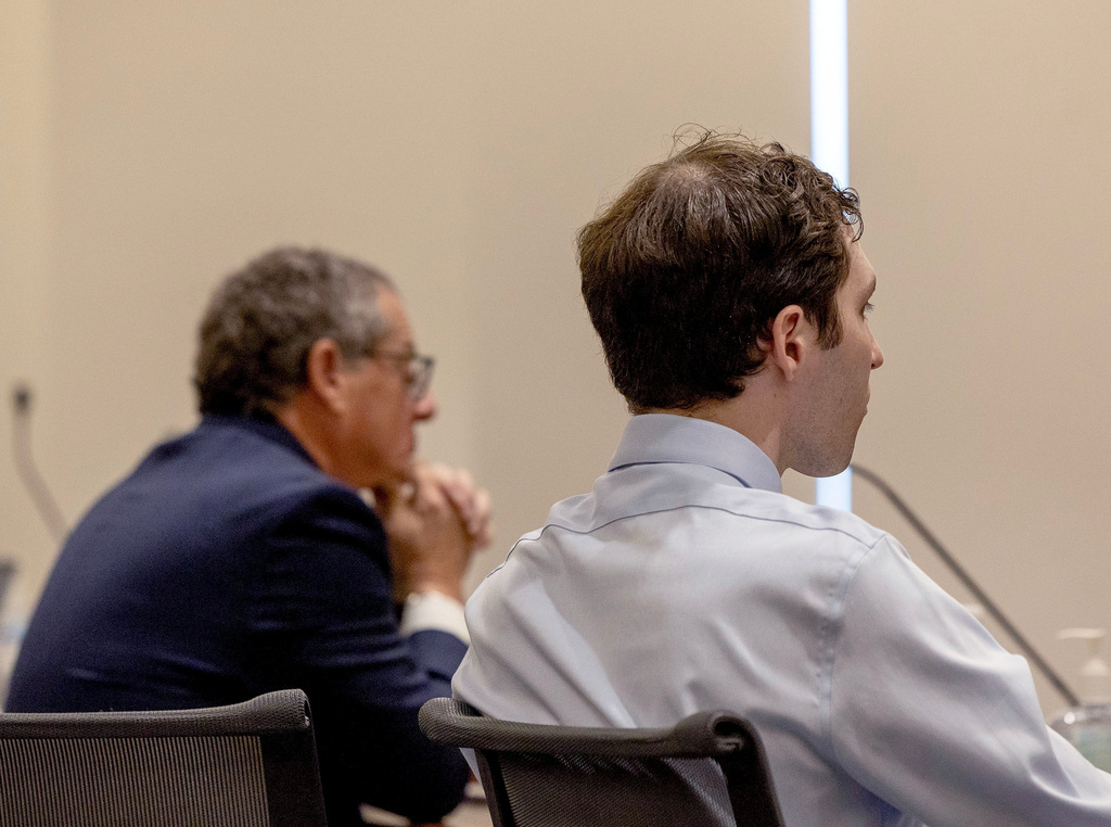 Attorney Richard Novak, left, and defendant Tyler Robinson, accused in the fatal shooting of conservative activist Charlie Kirk, attend a hearing, in 4th District Court, Friday, March. 13, 2026, in Provo, Utah. (Laura Seitz/The Deseret News via AP, Pool