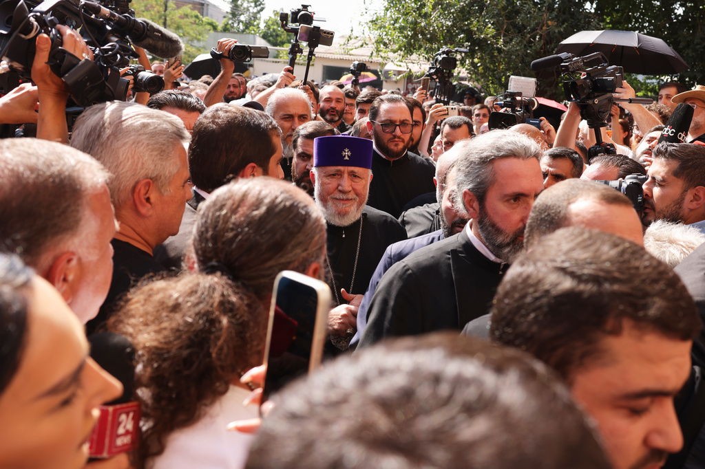 The head of the Armenian Apostolic Church Catholicos Karekin II, center, arrives at the Armavir Court of First Instance in Vagharshapat, Armenia, Friday, Aug. 7, 2026. (AP Photo/Anthony Pizzoferrato)