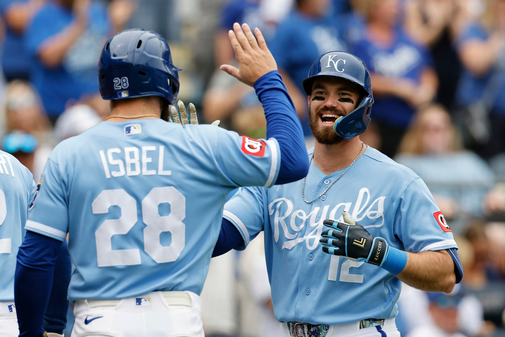 Kansas City Royals' Nick Loftin (12) celebrates after his three-run home run with Kyle Isbel (28) during the second inning of a baseball game against the Detroit Tigers in Kansas City, Mo., Sunday, Aug. 23, 2026. (AP Photo/Colin E. Braley)
