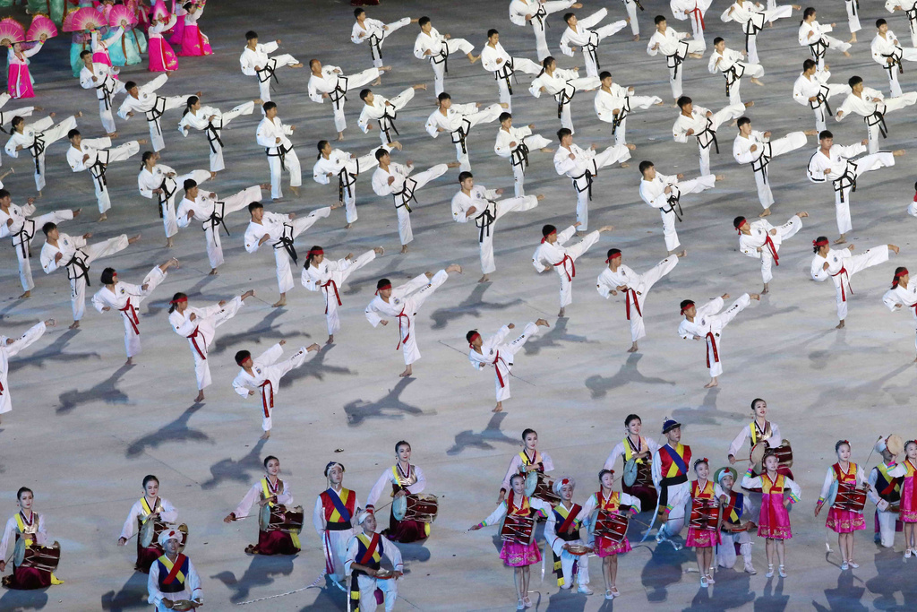 Mass gymnastics and artistic performance are held during the ceremony marking the 80th founding anniversary of the ruling Workers' Party at the May Day Stadium in Pyongyang, North Korea, Thursday evening, Oct. 9, 2025. (AP Photo/Cha Song Ho)