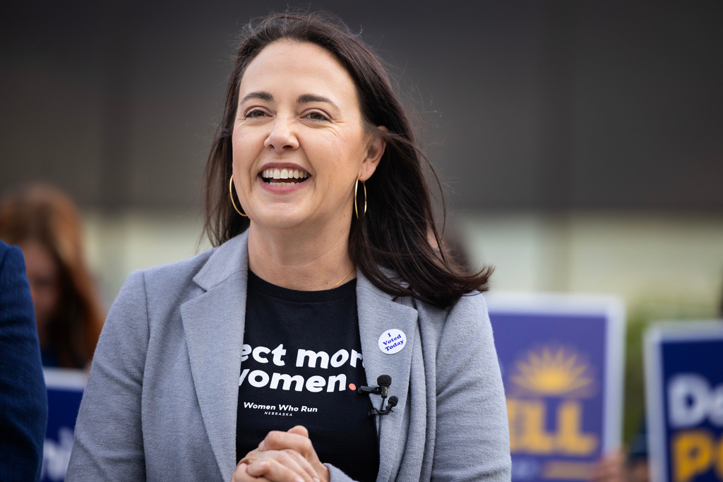 Denise Powell, candidate for the Democratic nomination to the House of Representatives in Nebraska's second district, speaks to the media after casting her ballot in the Nebraska Primary Election at Omaha Community Playhouse Tuesday, May 12, 2026, in Omaha, Neb. (AP Photo/Rebecca S. Gratz)