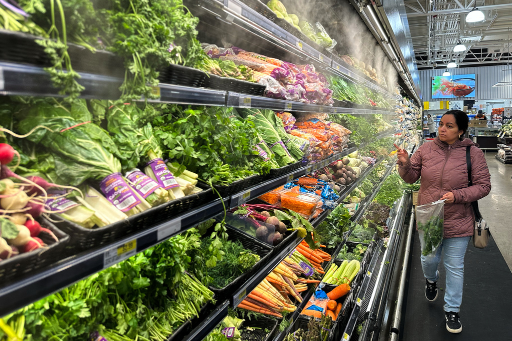 A person shops at a grocery store in Schaumburg, Ill., Monday, Feb. 9, 2026. (AP Photo/Nam Y. Huh)