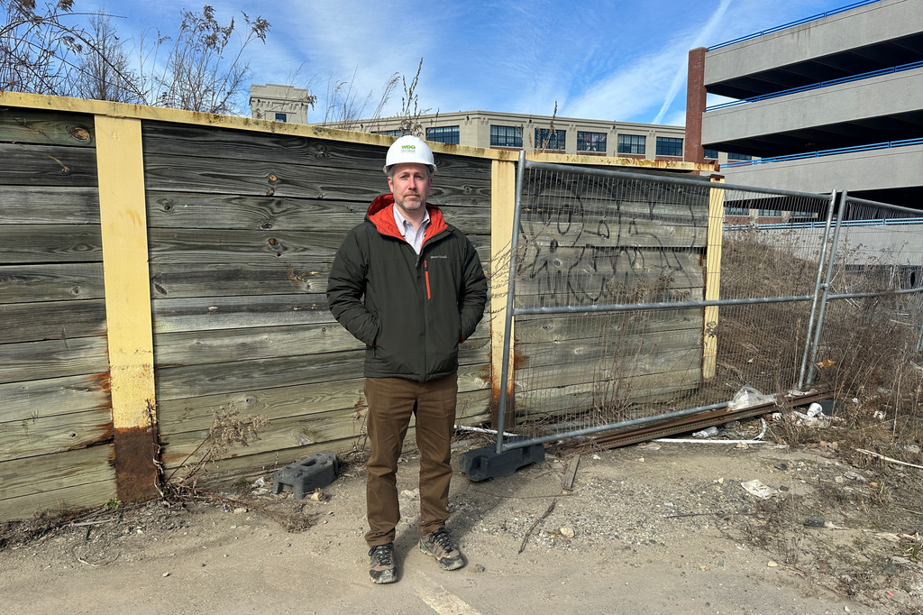 Tyler Norod, from the Westbrook Development Corporation, stands for a photo at a development site Tuesday, March 17, 2026, in Biddeford, Maine. (AP Photo/Patrick Whittle)