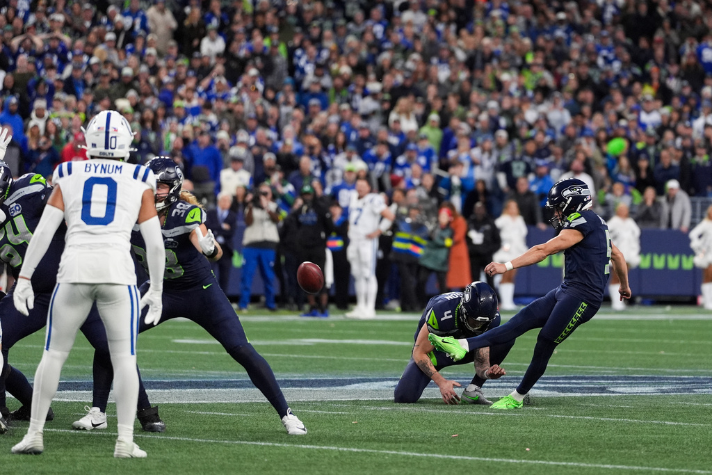 Seattle Seahawks place-kicker Jason Myers (5) kicks the game-winning field goal during the second half of an NFL football game against the Indianapolis Colts, Sunday, Dec. 14, 2025, in Seattle. (AP Photo/Lindsey Wasson)