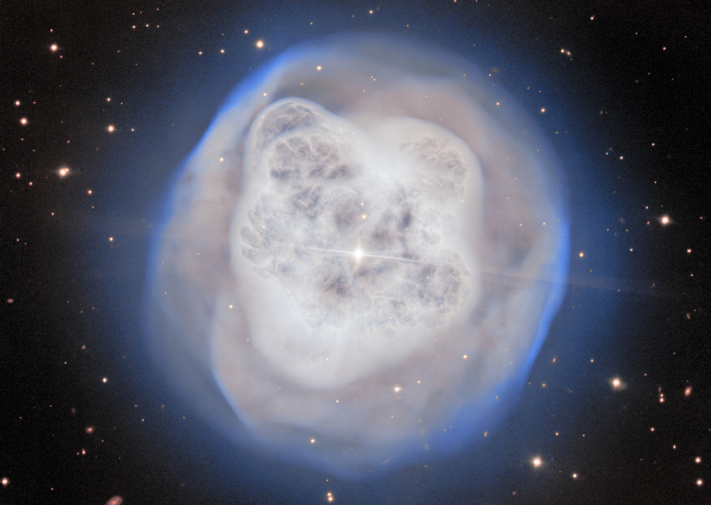 This image provided by the U.S. National Science Foundation’s NOIRLab on Thursday, May 21, 2026, shows the Crystal Ball Nebula. (NSF NOIRLab via AP)