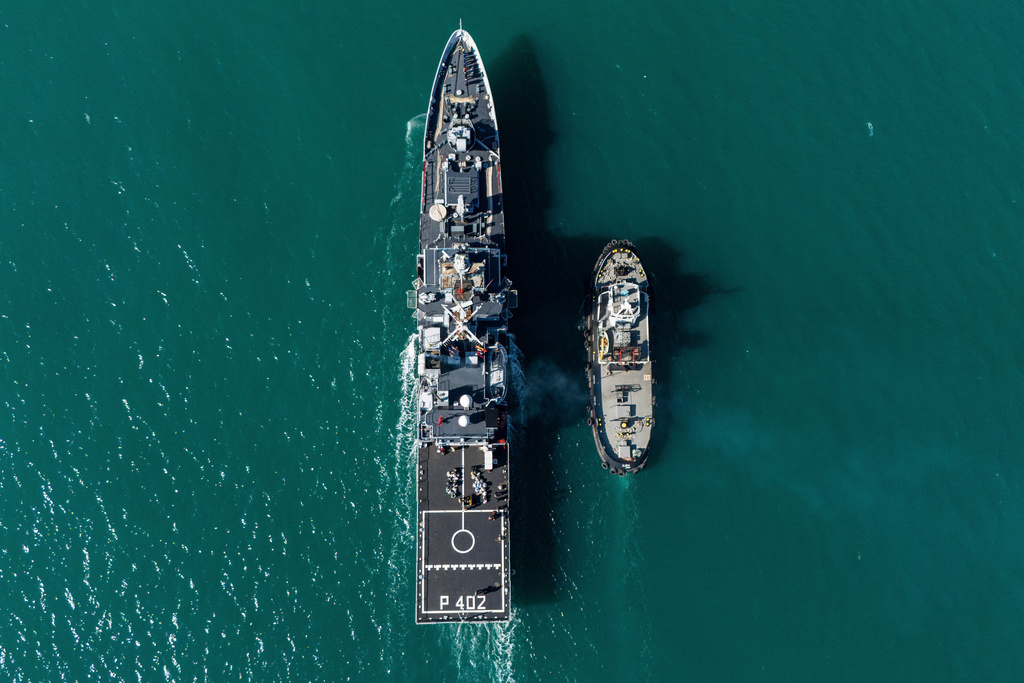 FILE - The Italian navy ship Libra approaches port as Italian authorities transfer 40 migrants with no permission to remain in the country to Italian-run migration detention centers in Albania, in Shengjin, Albania, April 11, 2025. (AP Photo/Vlasov Sulaj, File)