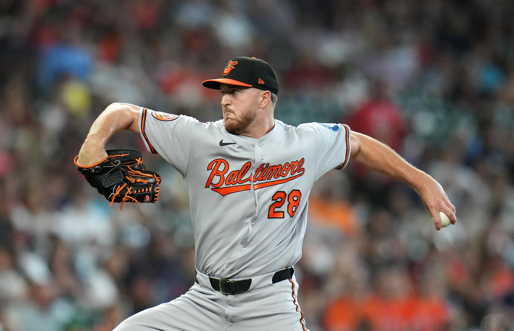 Baltimore Orioles starting pitcher Trevor Rogers delivers to Houston Astros' Isaac Paredes during the first inning of a baseball game, Saturday, July 18, 2026, in Houston. (AP Photo/Karen Warren)
