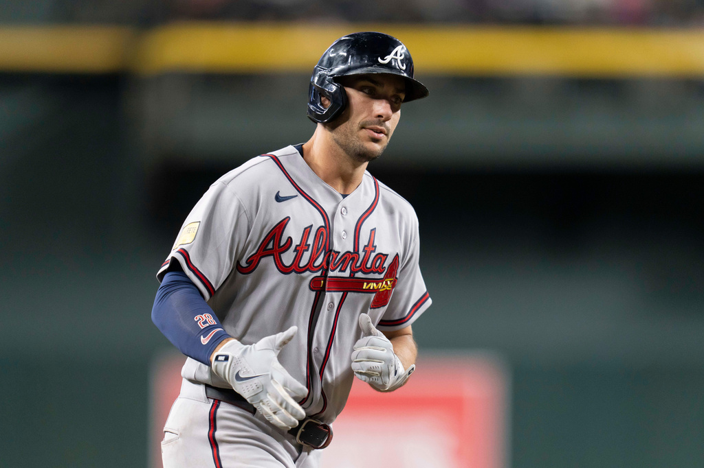 Atlanta Braves first baseman Matt Olson (28) rounds the bases after hitting a home run during the ninth inning of a baseball game against the Arizona Diamondbacks, Friday, April 3, 2026, in Phoenix. (AP Photo/Rebecca Noble)