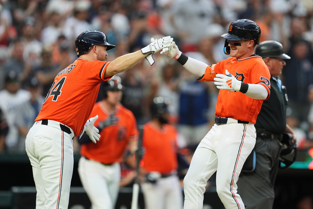Detroit Tigers' Kevin McGonigle, right, celebrates his two-run home rune with Jake Rogers (34) against the Philadelphia Phillies during the third inning Friday, July 10, 2026, in Detroit. (AP Photo/Paul Sancya)