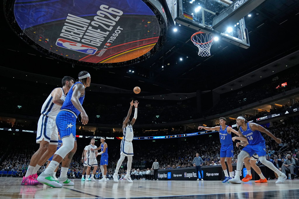 Memphis Grizzlies forward Jaren Jackson Jr. (8) shoots during an NBA basketball game between Orlando Magic and Memphis Grizzlies in Berlin, Germany, Thursday, Jan. 15, 2026. (AP Photo/Ebrahim Noroozi)