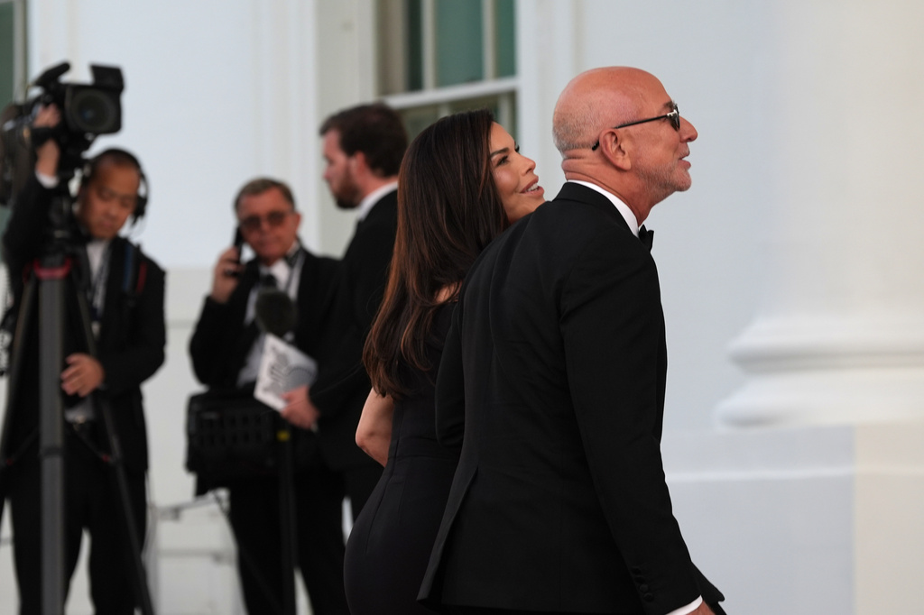 Jeff Bezos and his wife Lauren arrive for a State Dinner with President Donald Trump and China's President Xi Jinping at the White House, Thursday, Sept. 24, 2026, in Washington. (AP Photo/Alex Brandon)