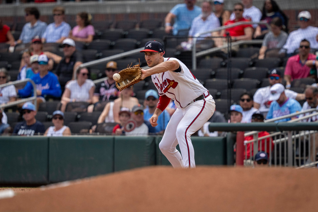 Atlanta Braves first baseman Matt Olson catches a groundout during the seventh inning of a baseball game against the Arizona Diamondbacks, Sunday, Aug. 16, 2026, in Atlanta. (AP Photo/Erik Rank)
