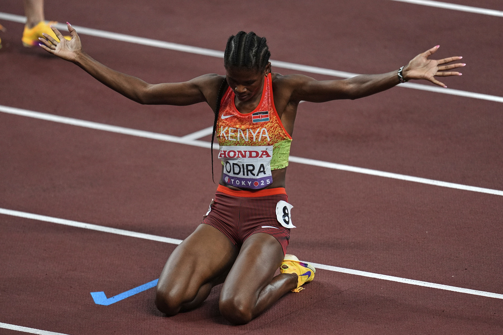 Kenya's Lilian Odira celebrates after winning the women's 800 meters final at the World Athletics Championships in Tokyo, Sunday, Sept. 21, 2025. (AP Photo/Abbie Parr)
