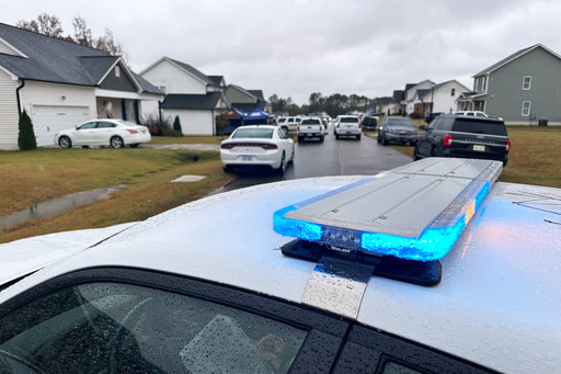Law enforcement vehicles block the road to Wellington Delano Dickens III's home, where remains were found after Dickens told authorities he had killed four of his children, in Zebulon, N.C., on Tuesday, Oct. 28, 2025. (AP Photo/Allen G. Breed) Law enforcement vehicles block the road to Wellington Delano Dickens III's home, where remains were found after Dickens told authorities he had killed four of his children, in Zebulon, N.C., on Tuesday, Oct. 28, 2025. (AP Photo/Allen G. Breed)