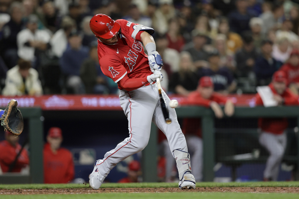 Los Angeles Angels' Mike Trout hits a solo home run off Seattle Mariners starting pitcher Bryce Miller during the fifth inning of a baseball game Thursday, Sept. 11, 2025, in Seattle. (AP Photo/John Froschauer)