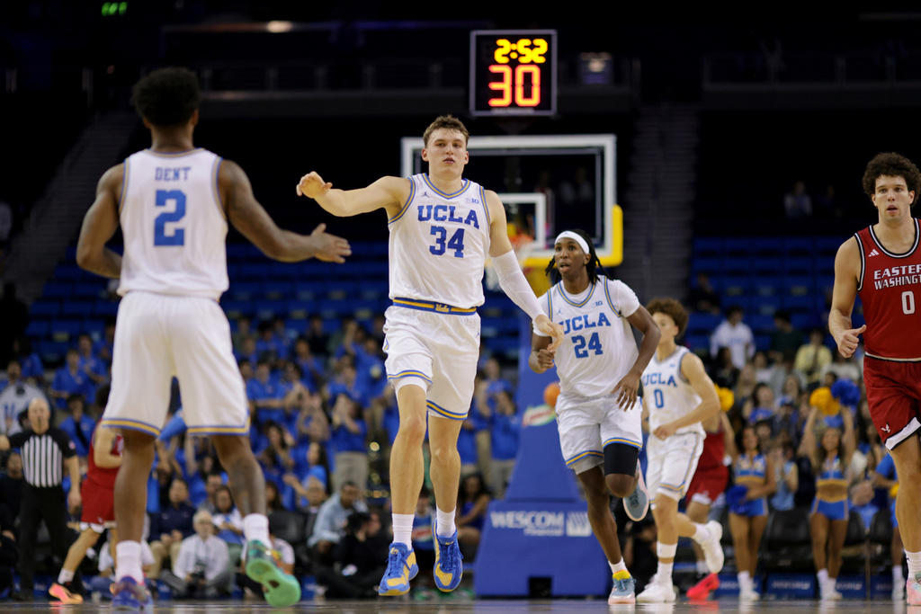 UCLA forward Tyler Bilodeau (34) reacts after scoring against Eastern Washington during the first half of an NCAA college basketball game Monday, Nov. 3, 2025, in Los Angeles. (AP Photo/Ethan Swope)