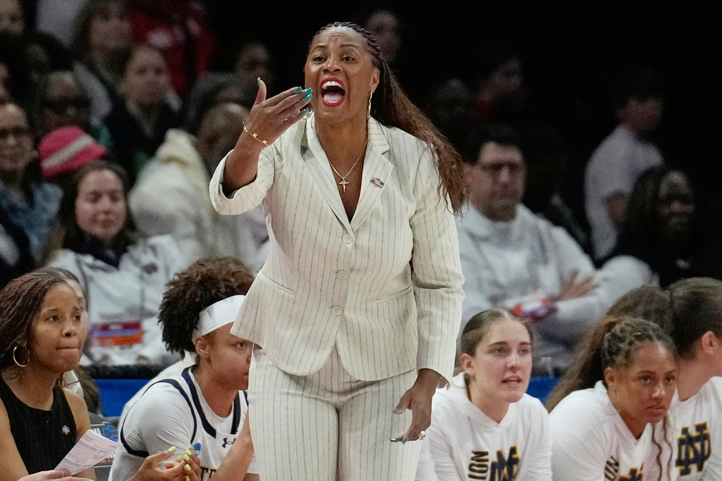 Notre Dame head coach Niele Ivey directs here team in the first half against Fairfield in the first round of the NCAA college basketball tournament, Saturday, March 21, 2026, in Columbus, Ohio. (AP Photo/Sue Ogrocki)