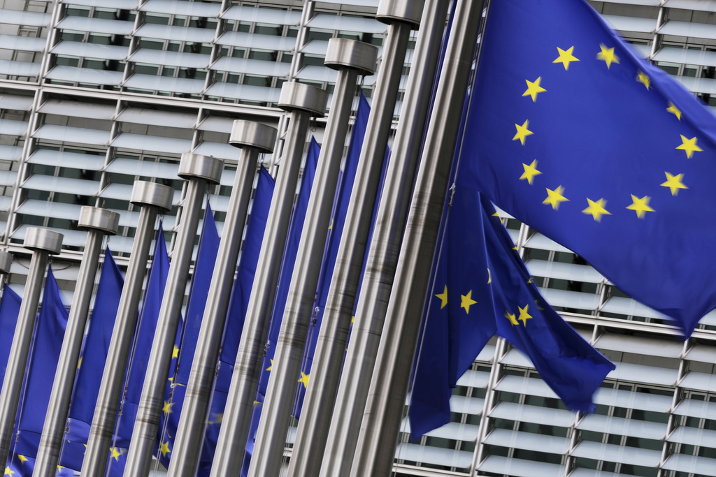 European Union flags flap in the wind outside EU headquarters in Brussels, Wednesday, Sept. 3, 2025. (AP Photo/Virginia Mayo)