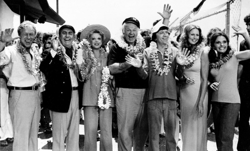 FILE - The cast of "Gilligan's Island," from left, Russell Johnson, as the professor; Jim Backus as Thurston Howell III; Natalie Schafer, as Mrs. Howell III; Alan Hale Jr., as the skipper; Bob Denver, as Gilligan; Judith Baldwin replacing original cast member Tina Louise, as Ginger, and Dawn Wells, as Mary Ann, posing during filming of a two-hour reunion show, "The Return from Gilligan's Island," in Los Angeles, Oct. 2, 1978. (AP Photo/Wally Fong, File) FILE - The cast of "Gilligan's Island," from left, Russell Johnson, as the professor; Jim Backus as Thurston Howell III; Natalie Schafer, as Mrs. Howell III; Alan Hale Jr., as the skipper; Bob Denver, as Gilligan; Judith Baldwin replacing original cast member Tina Louise, as Ginger, and Dawn Wells, as Mary Ann, posing during filming of a two-hour reunion show, "The Return from Gilligan's Island," in Los Angeles, Oct. 2, 1978. (AP Photo/Wally Fong, File)