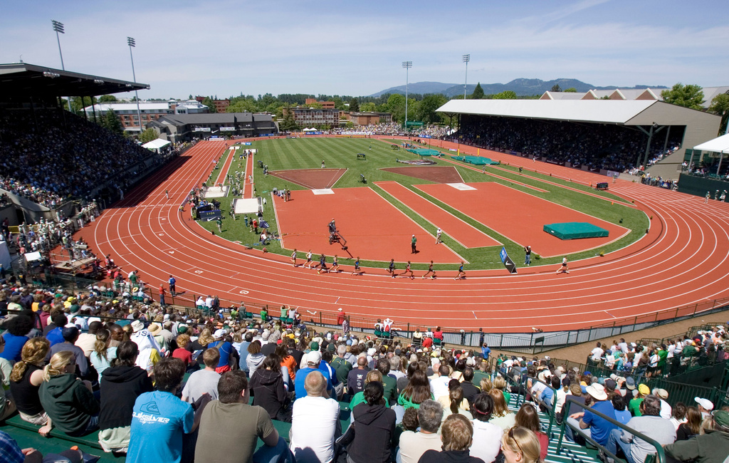 FILE - Distance runners round the track at Hayward Field during the Prefontaine Classic track and field meet in Eugene, Ore., June 8, 2008. (AP Photo/Don Ryan, file)