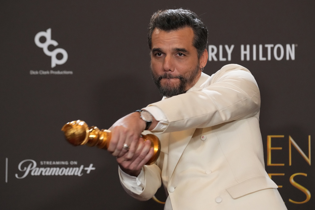 Wagner Moura poses in the press room with the award for best performance by a male actor in a motion picture – drama for "The Secret Agent" during the 83rd Golden Globes on Sunday, Jan. 11, 2026, at the Beverly Hilton in Beverly Hills, Calif. (AP Photo/Chris Pizzello)