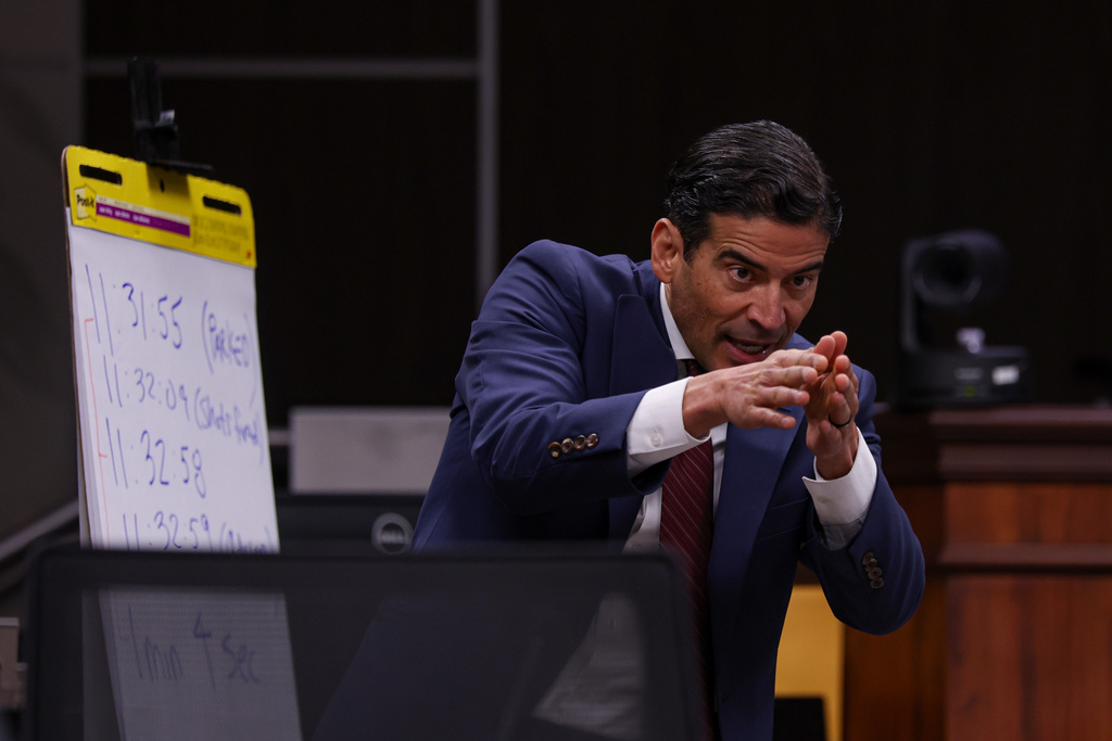 Defense attorney Nico LaHood cross-examines the prosecution's witness Nick Hill, a Texas Ranger lieutenant with the Texas Department of Public Safety, during the 10th day of the trial for former Uvalde school district police officer Adrian Gonzales at Nueces County Courthouse in Corpus Christi, Texas, Tuesday, Jan. 20, 2026. (Sam Owens/The San Antonio Express-News via AP, Pool)