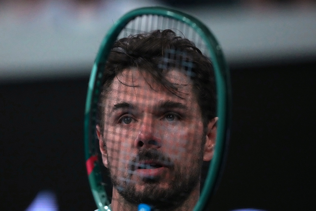 Stan Wawrinka of Switzerland reacts during his third round match against Taylor Fritz of the U.S. at the Australian Open tennis championship in Melbourne, Australia, Saturday, Jan. 24, 2026. (AP Photo/Asanka Brendon Ratnayake)