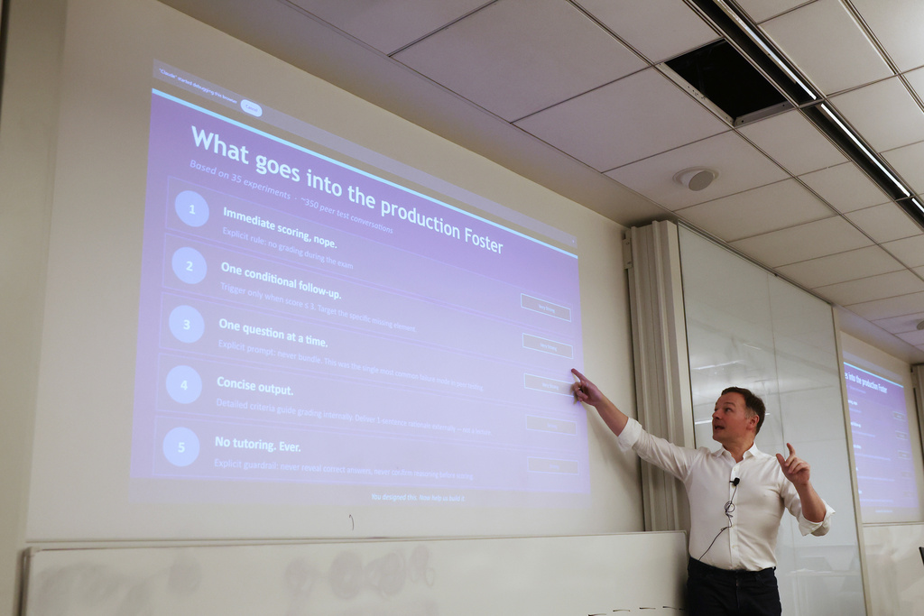 Professor Panos Ipeirotis speaks to students about an AI oral agent they'll be using for their final exam at NYU Stern School of Business, March 4, 2026, in New York. (AP Photo/Heather Khalifa)